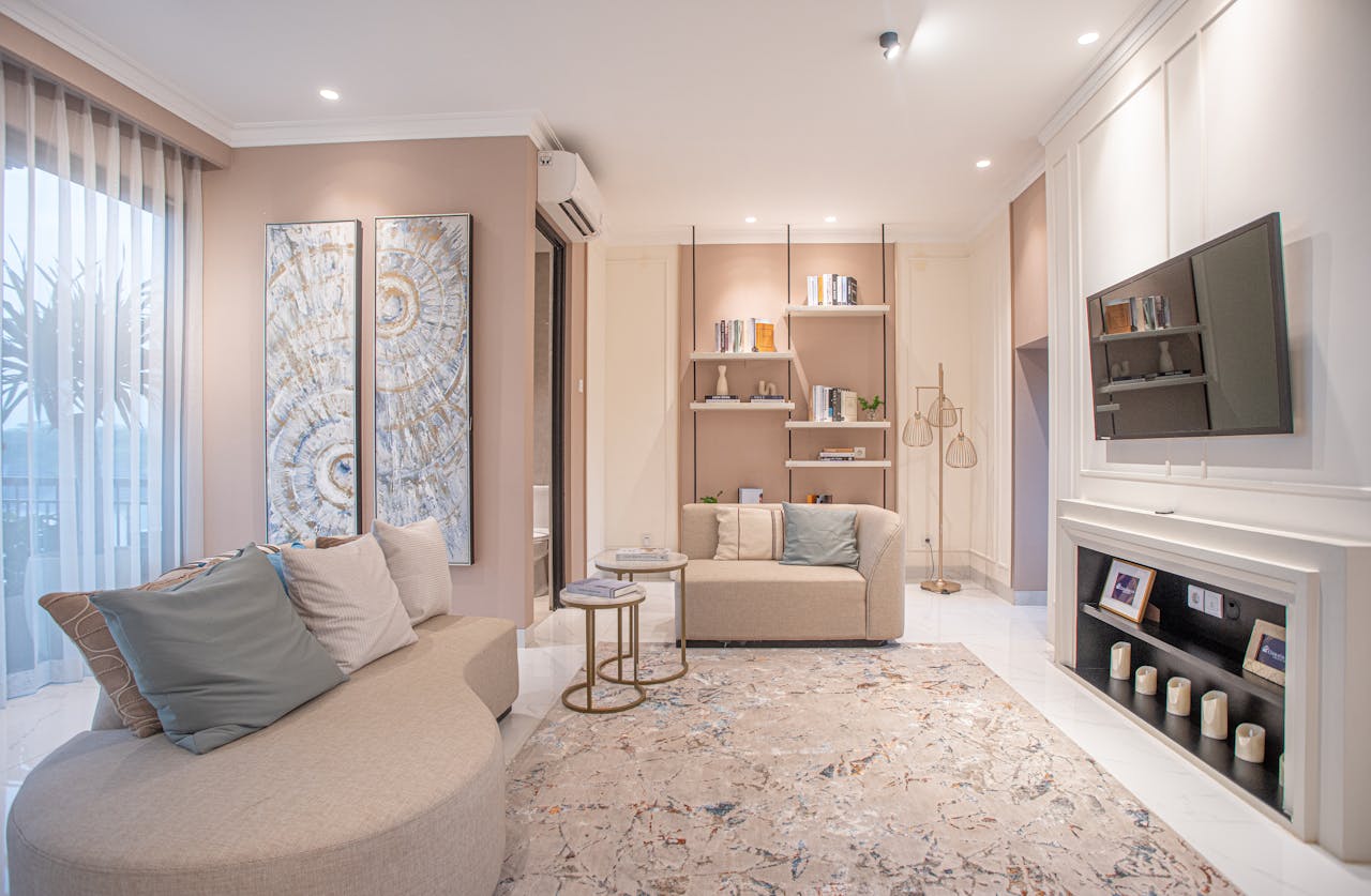 Elegant living room featuring neutral tones, modern furniture, and stylish wall art.